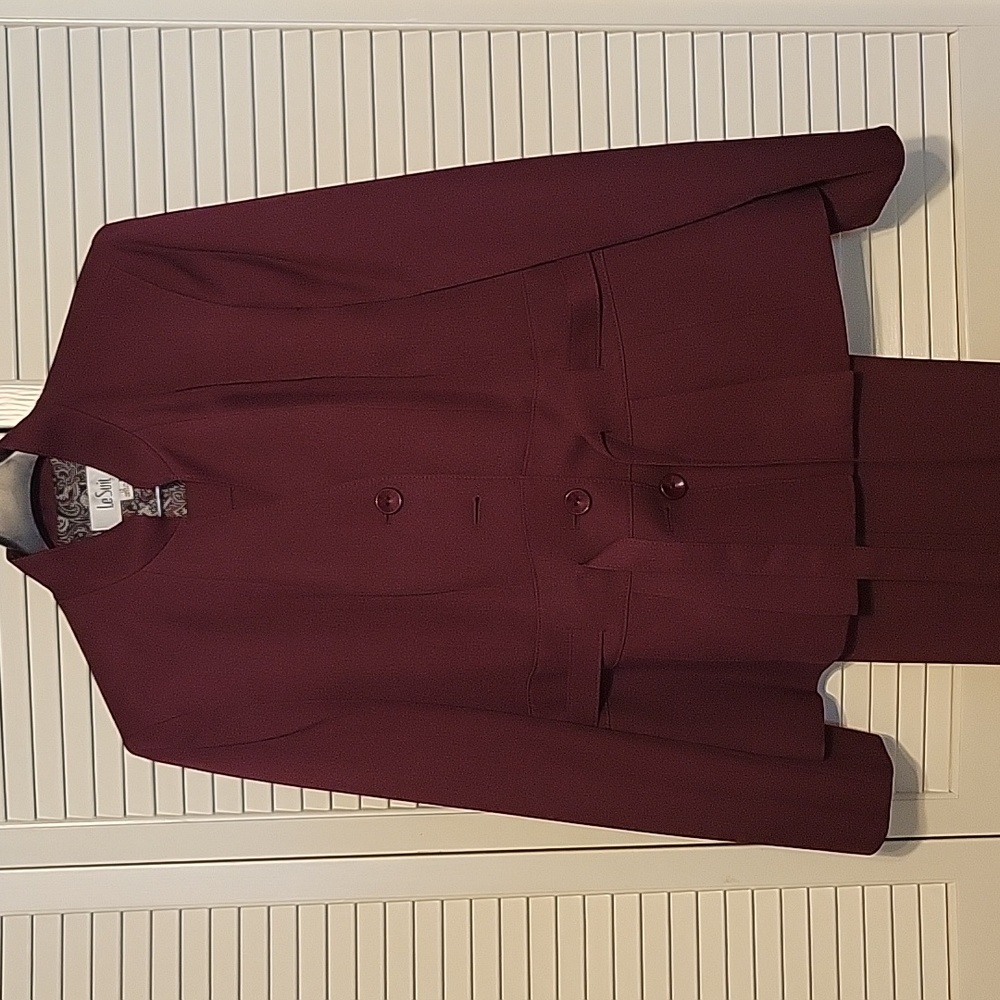 Burgandy lined jacket with fabric belt and matching lined trousers.  Sz 12